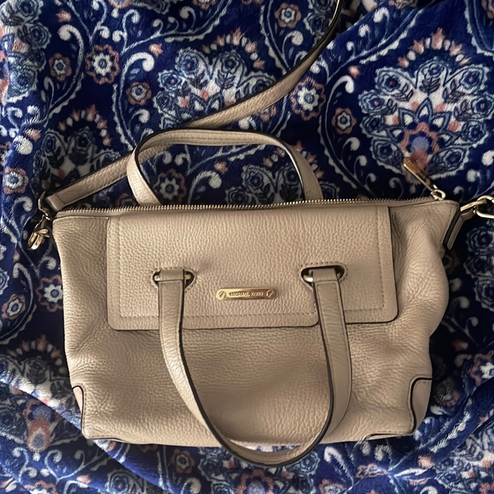 Authentic Michael Kors purse satchel, only stains are in the inside beige color